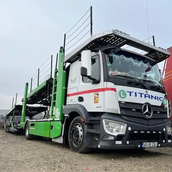 Cu ce transporți o mașină din Spania în România?